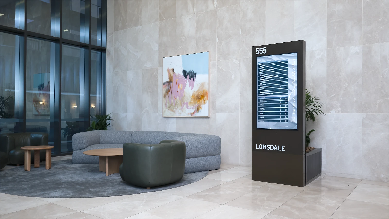 Custom Freestanding Digital Tenant Directory in the marble foyer of 555 Lonsdale St Melbourne.